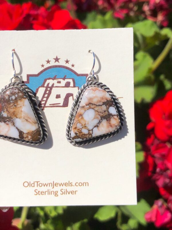 White buffalo triangle earrings in sterling silver.