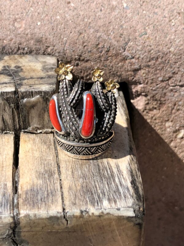 Cactus design ring with red coral and gold flowers.