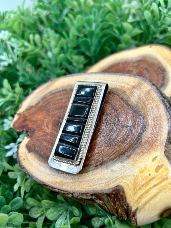 Sterling silver money clip with black onyx inlay.