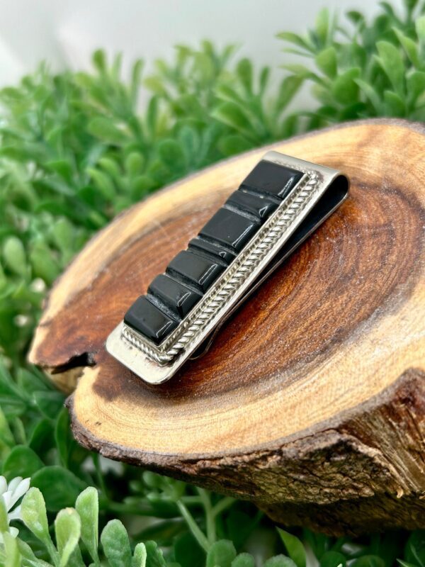 Sterling silver money clip with black onyx inlay.