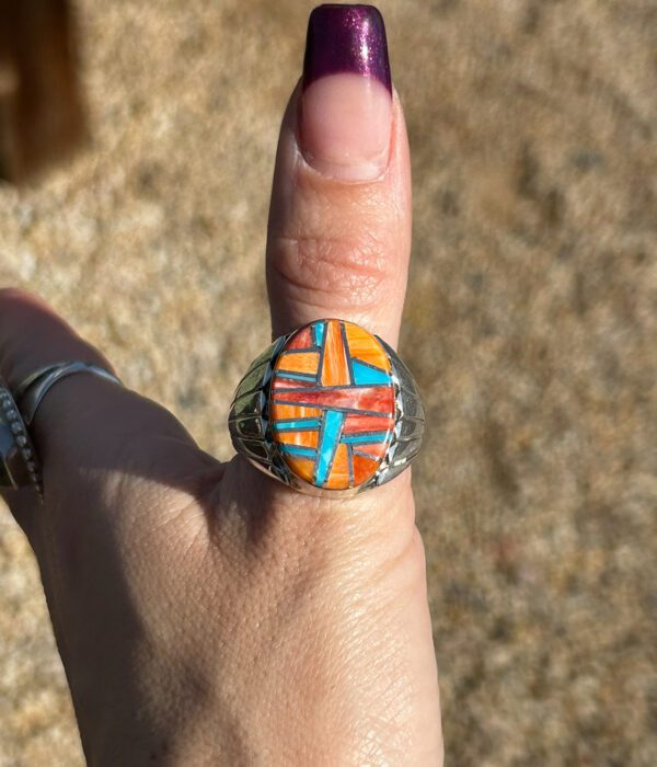 A colorful ring with a Native American design.