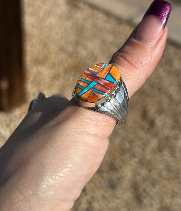 A colorful Native American ring with an oval inlay.